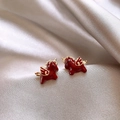 Close-up of red enamel pony earrings with golden wings on silk background - Winged Pony Style (8#)