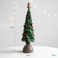 Detail of vintage Christmas tree decoration with golden star and red berry accents - Retro Christmas Tree Ornament Style D