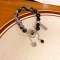 Bohemian multilayered bracelet with dark purple glass beads and silver butterfly charm - Red-Purple-Ruyi