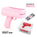 Pink electric money gun toy with prop bills and original box on a white background - Pink (Money GUN) / Pink Money Gun with Money GUN + 100 Notes