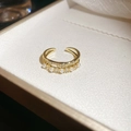 Macro shot of gold-plated crossover ring with delicate pearls and micro-set crystals - Double Layer Pearl Zirconia Open Ring / Gold