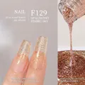 Japanese style plant-based gel nail polish in shade F129 gold bronze glitter finish - F129 Gypsophila (Champagne Gold)