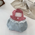 Detail of blue denim mini bag with bow embroidery, lace trim and red plaid accents - Light Blue Bow