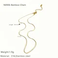 Detail view of 18K gold bamboo chain necklace with 316L stainless steel specs - Gold Bamboo Chain