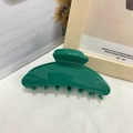 Elegant green acetate hair claw clip in a minimalist design for women's hairstyles - Green