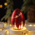 Egg-shaped red Christmas LED lamp with Santa sleigh and reindeer on a white base - Christmas Egg Shape Light / Red