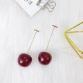 Deep red cherry fruit stud earrings with gold metal stems on white plush fabric background - Dark Red Style (WG3-0609)