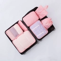 Set di 7 borse organizer da viaggio rosa chiaro riposte in una valigia nera - Rosa Pesca-Set da 7