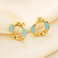 Detail of gold geometric earrings with sky blue enamel on smooth silk background - Geometric Irregular Style (KE114513-K)