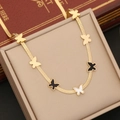 Elegant gold butterfly necklace with black and white pendant in a jewelry box - 1# Necklace