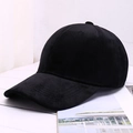 Classic black baseball cap with premium matte suede texture in a side view profile - One Size / Black
