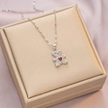 Silver bear necklace pendant with white zircons and a central red heart gemstone - 6061 Red Heart Bear / Silver