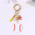 Baseball themed keychain with red bat and heart pendant on a white background - Gold Baseball Bat Word Heart Bow Set