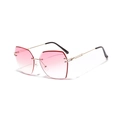Gafas de sol sin montura con cristales degradados rosas y patillas doradas - Rosa