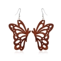 Detail of wooden butterfly earrings featuring fine openwork carving and silver hooks - Style 14
