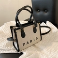 Minimalistische schwarz-weiße Canvas-Tragetasche mit PARIS-Print und Lederriemen - Klein / Klein Schwarz