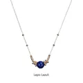 Detailed view of Lapis Lazuli sphere pendant with golden beads on stainless steel chain - Lapis Lazuli-Gold Chain