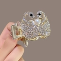 Pince à cheveux dorée motif double cygne avec strass brillants et grande perle centrale - Forme de Cygne / Or