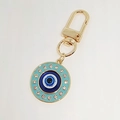 Porte-clés œil bleu avec strass en cristal et émail bleu clair sur finition dorée - Oeil Bleu Lac Strass