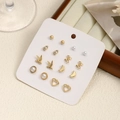 Set of six pairs of gold earrings with pearls, butterflies and moon shapes on card - Set 6 [Pearl + Heart]