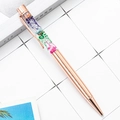 Penna a sfera in metallo oro rosa con fiori secchi colorati in tubo trasparente - Oro rosa