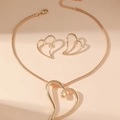 Golden heart-shaped pendant necklace and earrings set with twisted hollow design - Gold Heart Set
