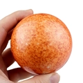 Close-up of PU foam squeeze ball toy showing realistic planetary texture and orange colors - Sun Pattern Stress Ball