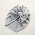 Close-up of light blue baby turban hat with waffle texture and large bow detail - 21*17 cm / Gray