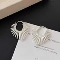 Silver 925 geometric earrings with radiant sunburst texture and modern metallic finish - A2622 Silver Radial Hoops