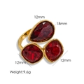 Goldener Titanstahlring mit facettierten roten Zirkonia in Tropfen- und Quadratform - Burgunderrot
