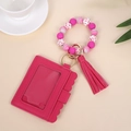 Pink silicone bead bracelet with PU leather card holder and tassel on beige background - Rose Red
