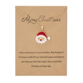 Collana dorata con ciondolo Babbo Natale in smalto su un biglietto di auguri Merry Christmas - Babbo Natale A