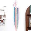Handwoven moon-shaped macrame dreamcatcher with multi-colored tassels on white wall - Colored Stripe Moon