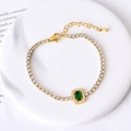 Elegant gold tennis bracelet with emerald rectangular stone and white cubic zirconia - Green Zircon Square