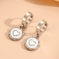 Detailed close-up of silver hoop earrings featuring white shell heart-shaped charms - Steel Color Heart Hoop Earrings (H309)
