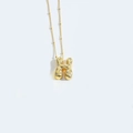 Golden necklace featuring a chubby H letter pendant with sparkling crystal accents - Style H