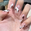 Glossy long coffin press-on nails with cream pink base and brown cow print pattern - Cream Coffee Cow Print Style (JP1222)