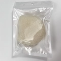 Biodegradable beige konjac facial sponge in clear plastic bag for deep cleansing - White Bear