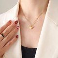 Minimalist gold wing pendant necklace on beaded chain with a sleek black face ring - Wing Round Pendant (P977) / 40+5CM Extension Chain / Gold