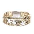 Close-up of champagne gold multilayer wrap bracelet with three silver star accents - Gold