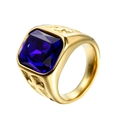 Macro detail of gold-tone ring featuring a large square blue gemstone with ornate relief - Gold Plated Blue Zirconia