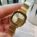 Minimalist gold square dial quartz watch with metallic strap worn in casual setting - Gold Strap Gold Dial (74650)
