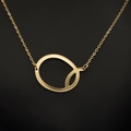 Elegant gold letter Q pendant necklace with a fine chain in a minimalist metal style - Gold Q