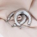 Polished silver titanium steel hoop earrings with textured twisted metal design - Shell Texture / Silver
