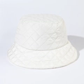 Detailed close-up of the white diamond quilted stitching on the padded bucket hat surface - Adjustable / White