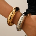 Exaggerated irregular hammered texture bangle set in polished gold and silver finish - Hammered Wide Bangle Set (A-824+A-825) / 2 Pieces/Set (Gold + Silver) / Multicolor