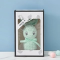 Light green coral fleece towel folded into a rabbit shape in a boutique gift box - Light Green + Leaf Gift Box