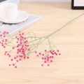 Pink artificial babys breath branch close-up on wooden table for wedding decor - Diamond-Purple Red