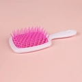 Hollow-out hair brush in white handle and pink mesh design for detangling and styling - White Handle + Pink