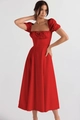 Detail view of red puff sleeve dress with floral print and square neckline design - S / Solid Red